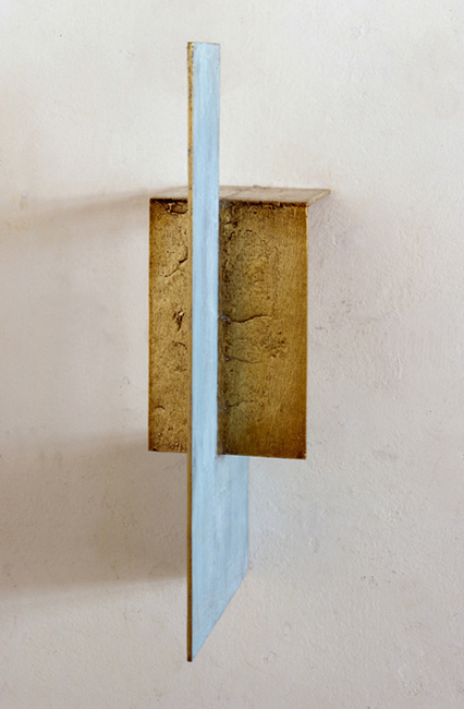 This is a photograph of a cast bronze wall work from Sjak Marks Direction Series.