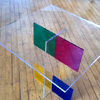Table design that uses multicolored plexiglas by artist Sjak Marks